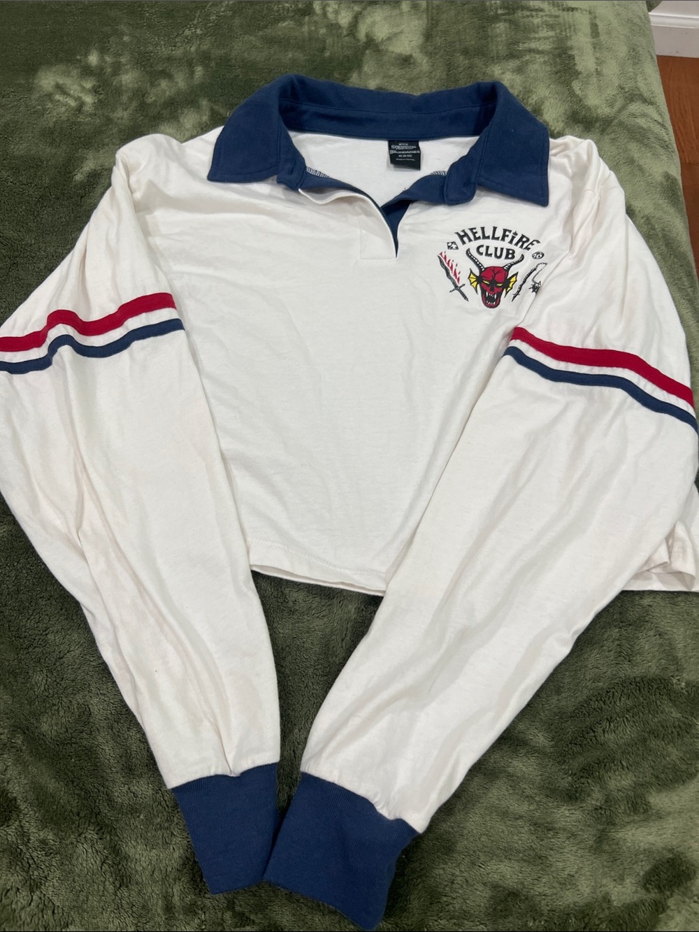 Netflix White Cropped Rugby Top with Navy Collar and Red & Navy Sleeve Stripes